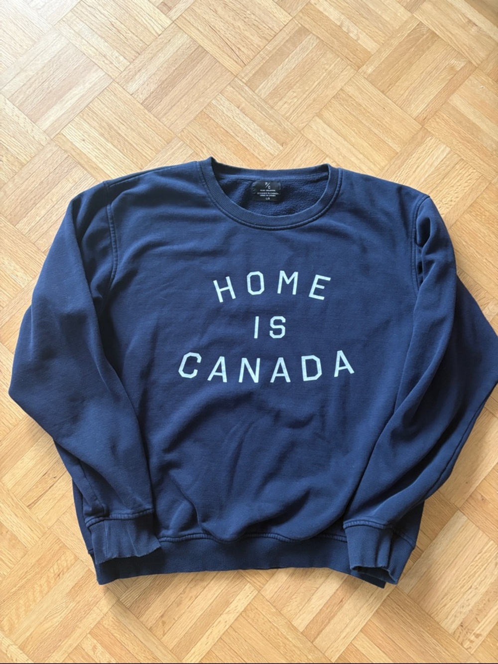 Peace Collective Navy "HOME IS CANADA" Graphic Sweatshirt